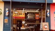 理发店如何做好门头(理发店门头如何做好店铺玻璃)